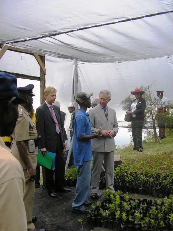 Conservation Science Officer, Marlon Beale explains to HRH the Prince of Wales, the propagation of native seedlings at the BJCMNP nursery at Holywell